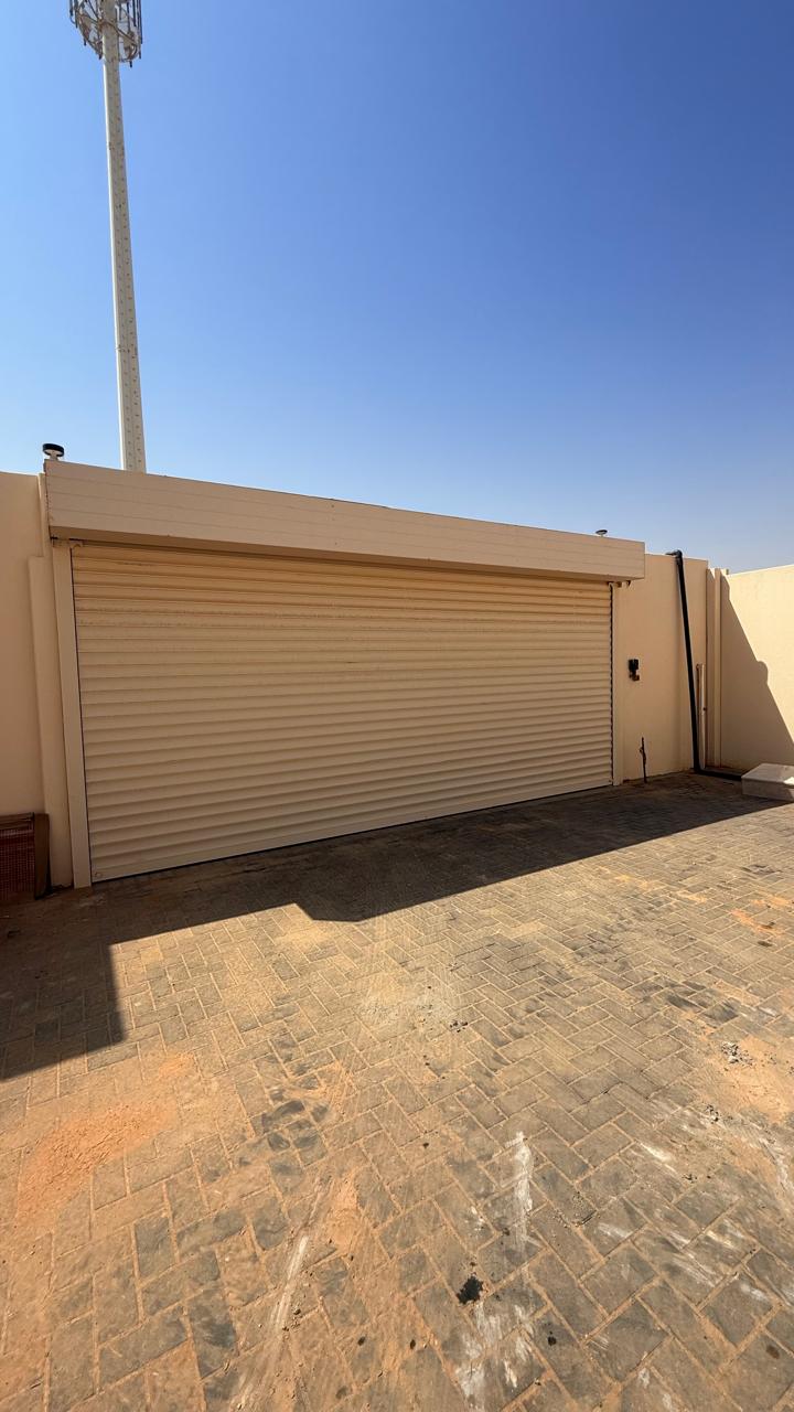 جهاز فتح باب الكراج بالتلفون 