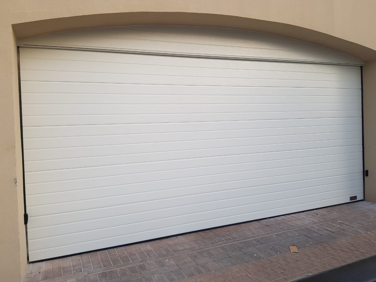 تصليح أبواب الكراج الأوتوماتيكية ( الاوفر هيد ) 